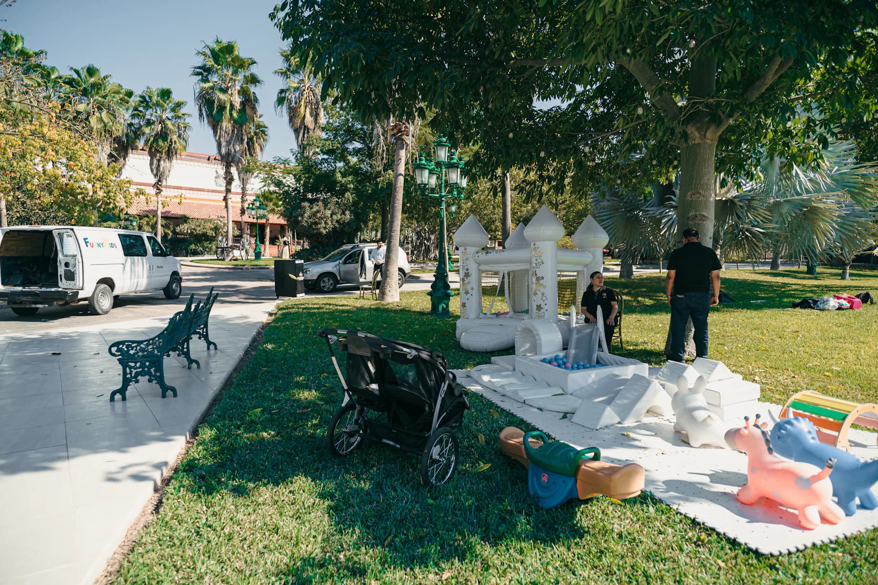 A commercial bounce house set up for a neighborhood family event